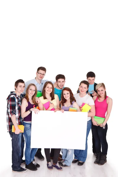Large group of students with blank sign — Stock Photo, Image