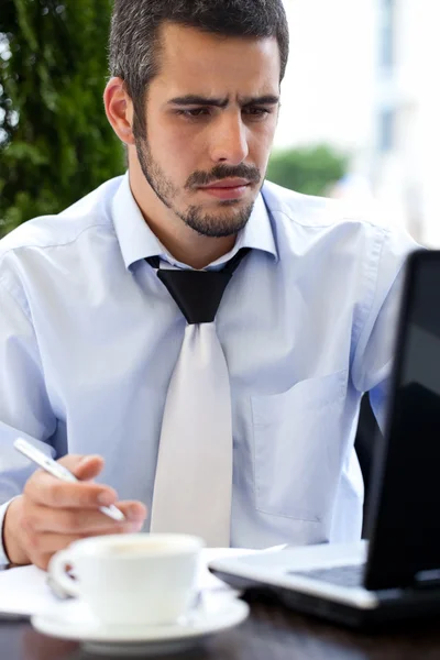 Cheerful young businessman working — Stock Photo, Image