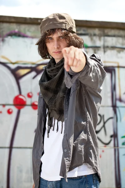 Funky boy pointing in camera — Stock Photo, Image