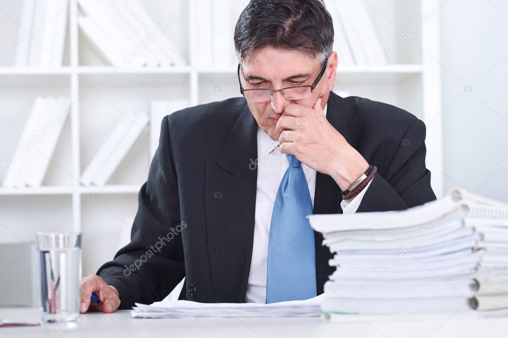 Senior businessman concentrate on work
