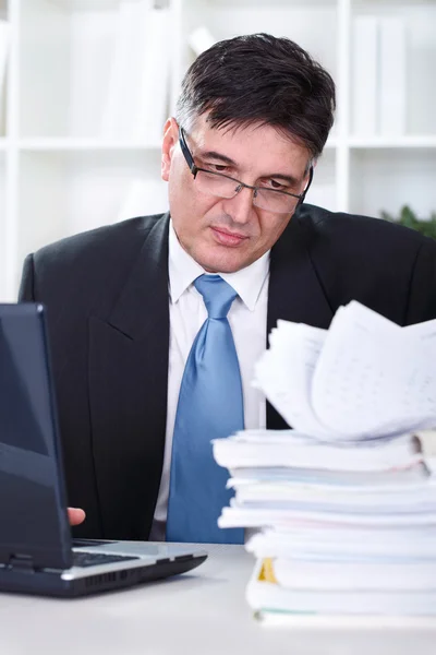 Businessman transferring data to the computer — Stock Photo, Image