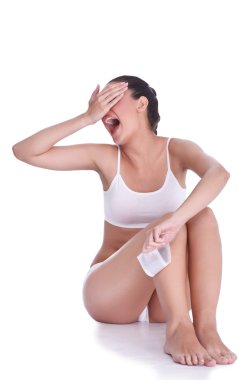 Expression woman depilating her legs clipart