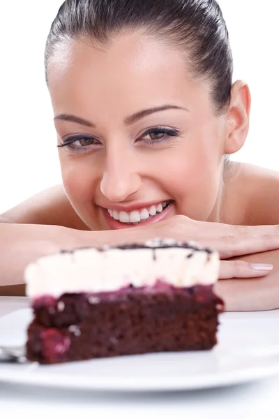 Happy woman looking in tasty cakes — Stok fotoğraf