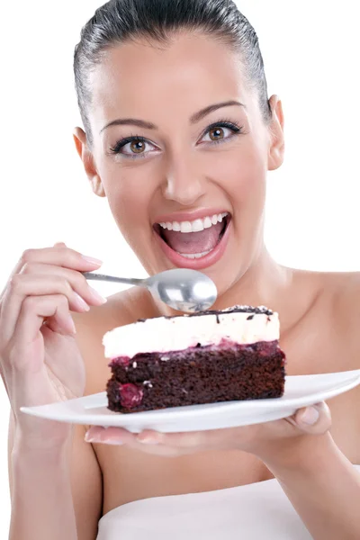 맛 있는 케이크를 먹고 흥분된 여자 — 스톡 사진