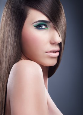 Make-up, perfect hair on a sexy woman clipart