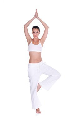 Young woman doing yoga exercise clipart