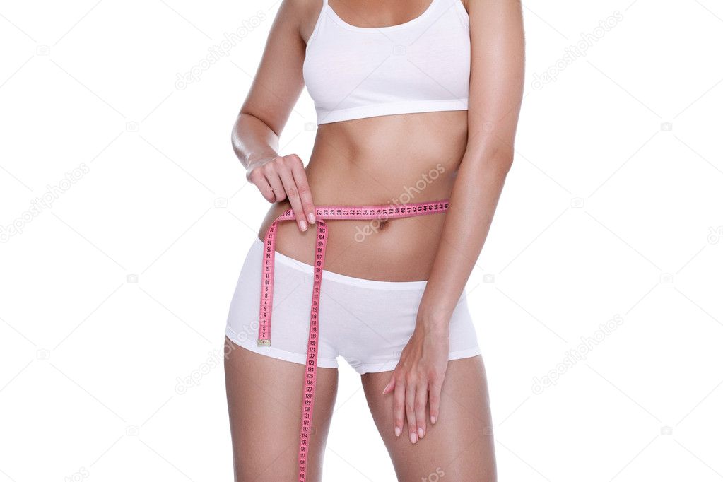 Woman and measure tape around her body