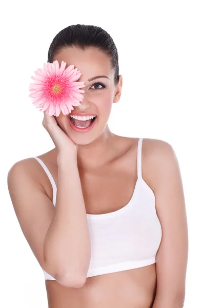 Donna sorridente con gerber — Foto Stock