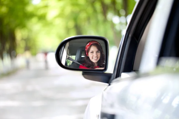 Smiling woman driving — 스톡 사진