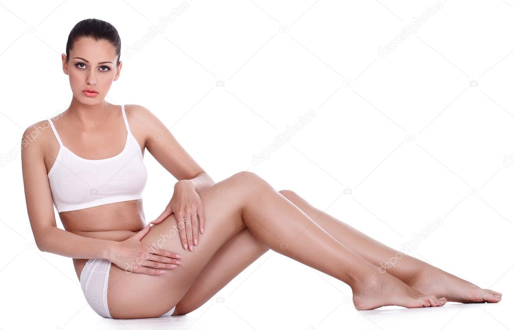 Young woman showing cellulite