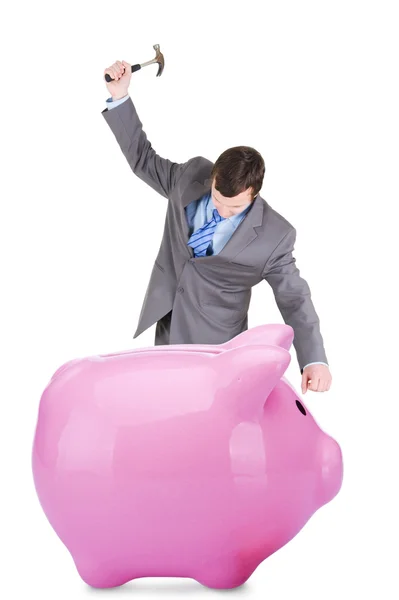 Young businessman and piggy bank — Stock Photo, Image