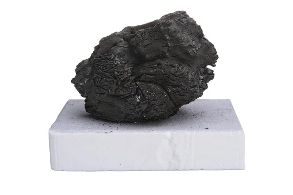 Black coal and white firelighter — Stock Photo, Image