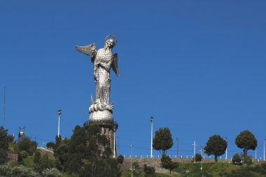 Statue of the Madonna on El Panecillo in Quito, Ecuador clipart