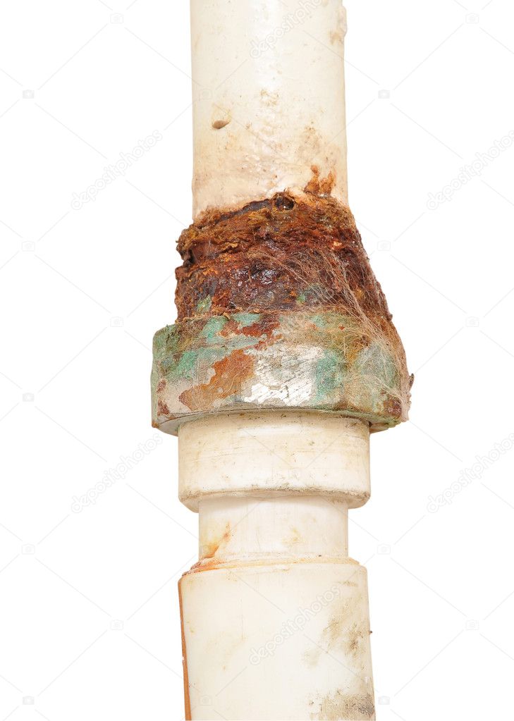 Old rusty industrial tap water pipe and valve.