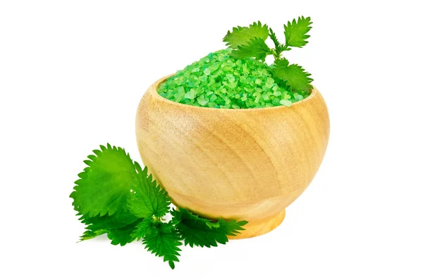 Salt in the green wood bowl with nettle — Stock Photo, Image