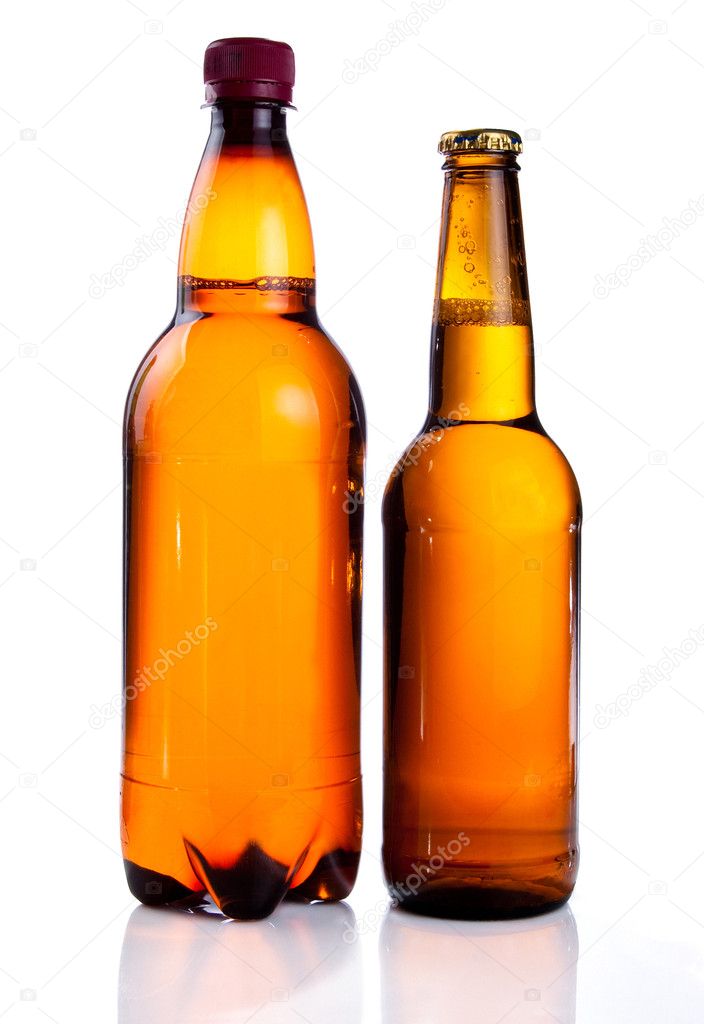 Isolated Brown plastic bottle and glass bottle of beer on a whit