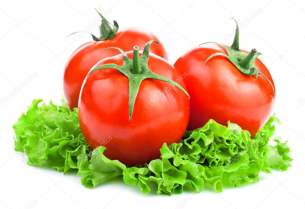 Three Red Ripe Tomatoes and lettuce on White background