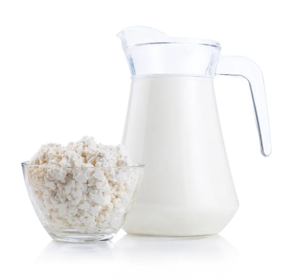 Cup serving of Cottage Cheese and Jug of fresh milk Isolated on — Stock Photo, Image