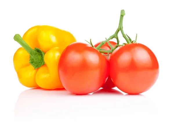 Sweet yellow bell pepper and Three Vine fresh juicy tomato Isola — Stock Photo, Image