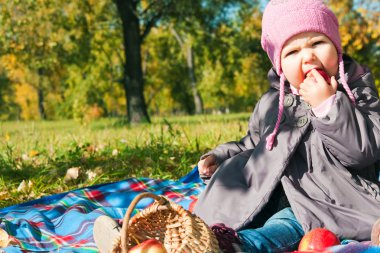 The little girl playing park