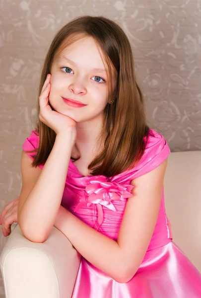 Girl in a pink dress — Stock Photo, Image