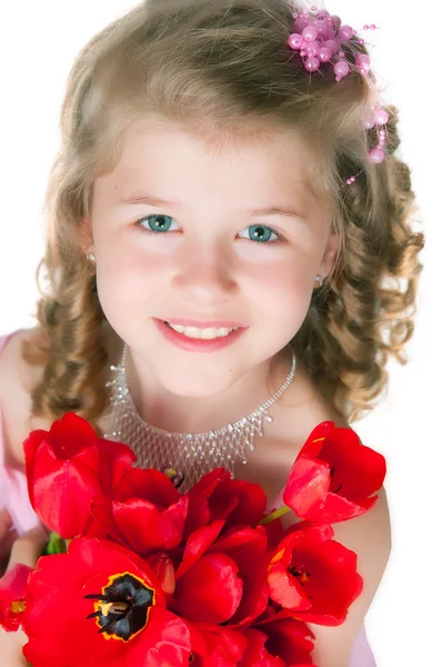 Meisje met een boeket tulpen — Stockfoto