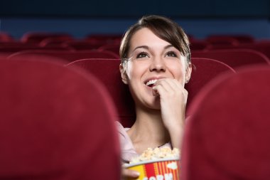 Woman at the cinema clipart