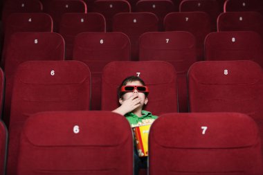 Toddler boy with popcorn clipart