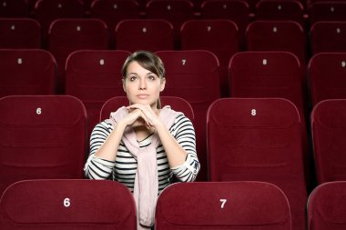 A woman in the movie theatre clipart