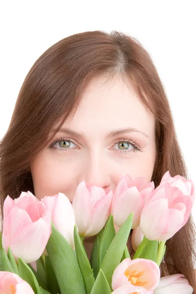 Vrouw staand met boeket van tulpen — Stockfoto