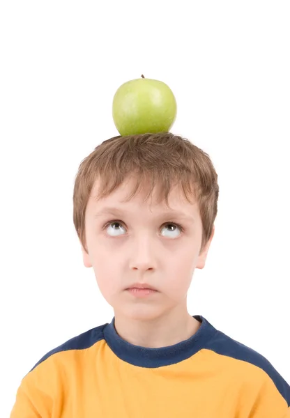 Mladý chlapec s apple — Stock fotografie