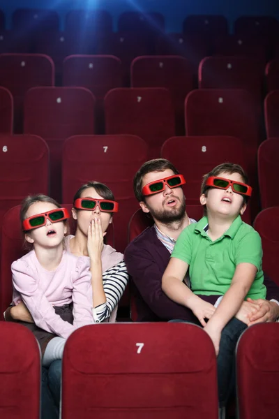 Surprised family in 3D movie theatre — Stock Photo, Image