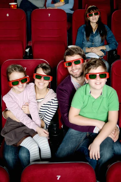 Happy family watching a movie — Stock Photo, Image