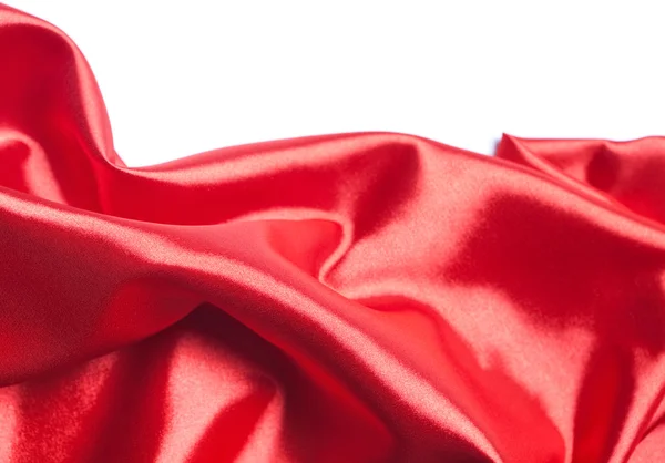 Red silk fabric over white background — Stock Photo, Image