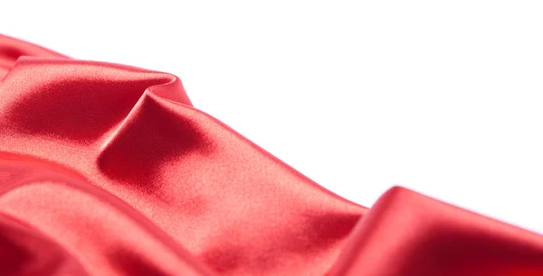 Red satin fabric over white — Stock Photo, Image
