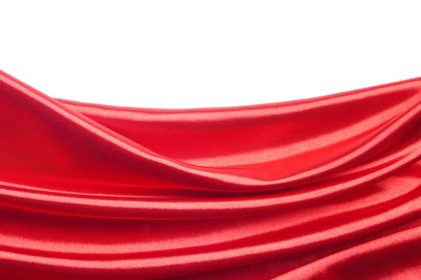 Красная атласная ткань на белом фоне — стоковое фото