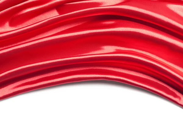Красная шелковая ткань на белом фоне — стоковое фото