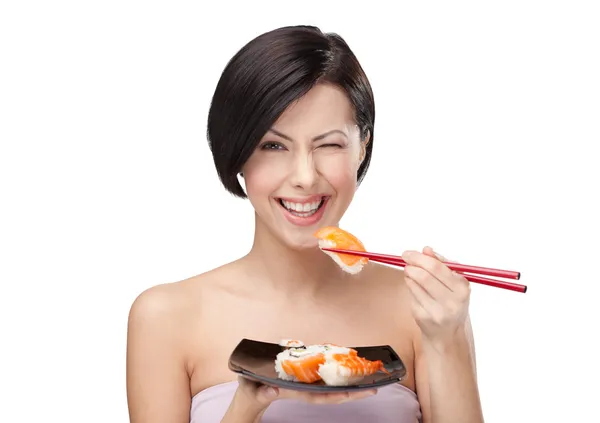 Mulher bonita comer sushi — Fotografia de Stock