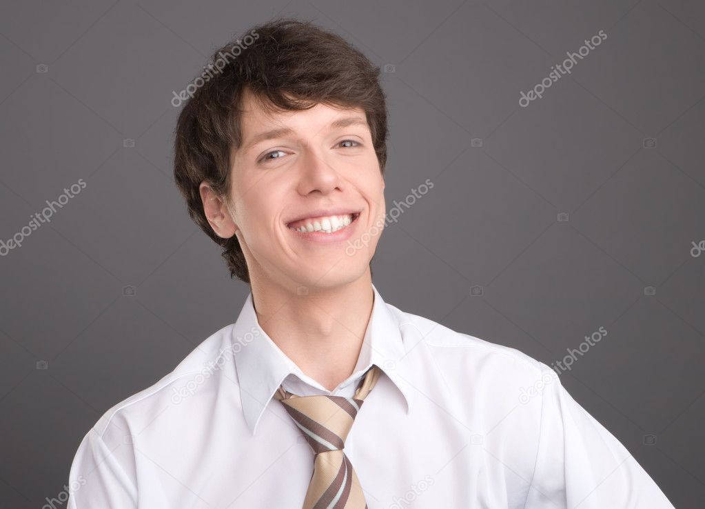 Young businessman smililing portrait
