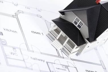 Construction plan with home architectural model clipart