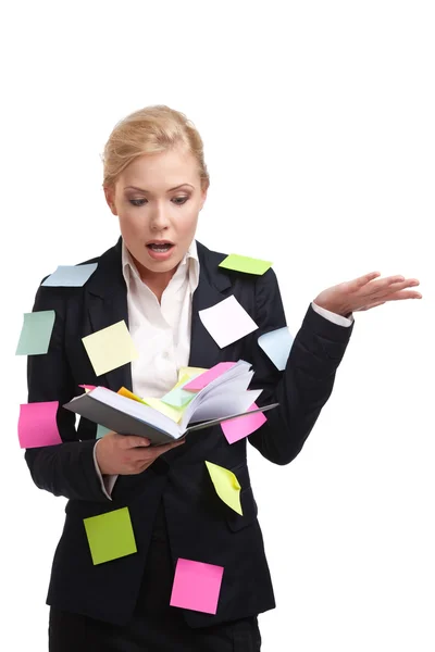 Mulher de negócios loira com um diário isolado no fundo branco — Fotografia de Stock