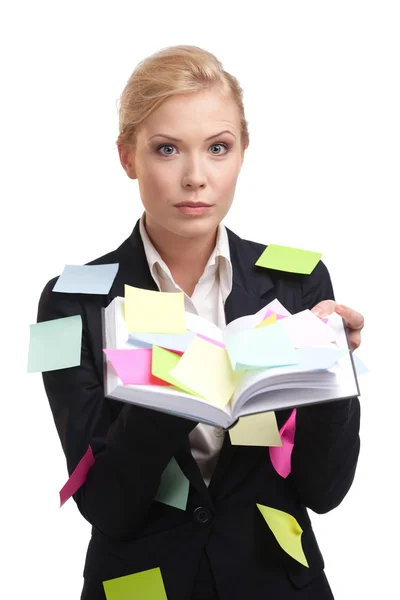Aantrekkelijke zakenvrouw met een dagboek geïsoleerd op witte achtergrond — Stockfoto