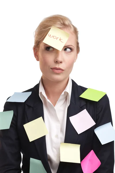 Блондинка-бизнесвумен с цветными наклейками на лице — стоковое фото