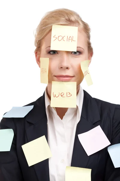 Blonde business woman with colored stickers on her face — Stock Photo, Image