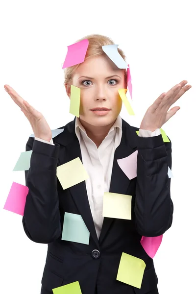 Young business woman with colored stickers on her face — Stock Photo, Image