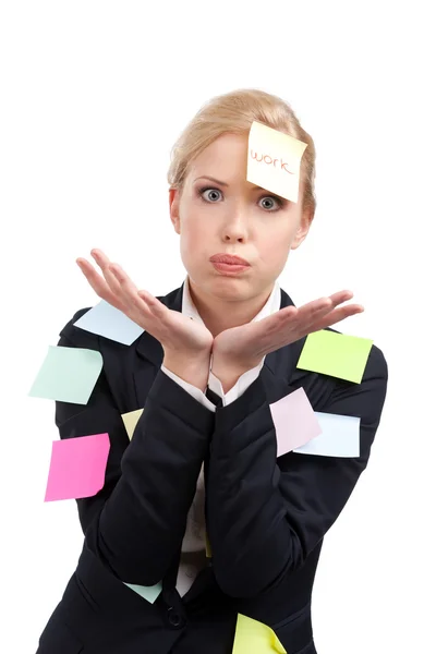 Tired businesswoman with colored stickers on her face — Stock Photo, Image