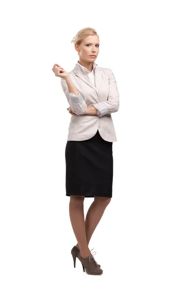 Zakenvrouw in een licht beige pak, volledige lengte portret — Stockfoto
