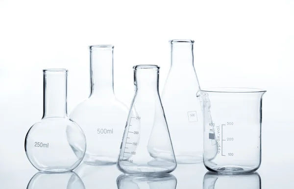 Five empty laboratory flacks — Stock Photo, Image