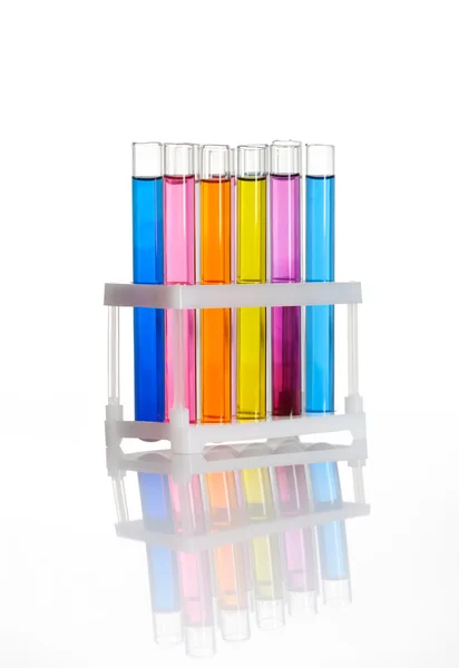 Set of test tubes in a rack, isolated — Stok fotoğraf
