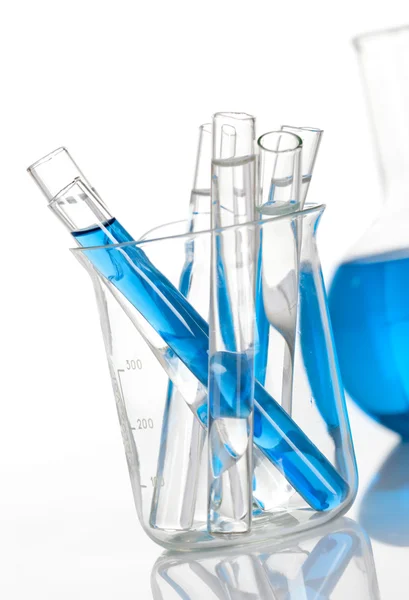 Chemical flask with a group of tubes inside — Stock Photo, Image